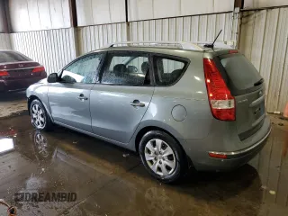 2011 Hyundai Elantra Touring SE with VIN KMHDC8AE7BU090319, listed as a Copart auction lot 70459194 with 177,130 mi miles and Salvage Title. Bid and sale history available at carsss.com. Image 2.