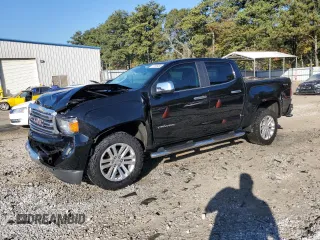 2018 GMC Canyon 4WD SLT with VIN 1GTG6DEN4J1296628, listed as a Copart auction lot 77135484 with 74,486 mi miles and Salvage Title. Bid and sale history available at carsss.com. Image 1.