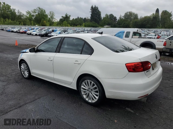 2013 Volkswagen Jetta TDI with VIN 3VWLL7AJ8DM352991, listed as a Copart auction lot 68473304 with 102,097 mi miles and Salvage title. Bid and sale history available at DreamBid. Image 2.