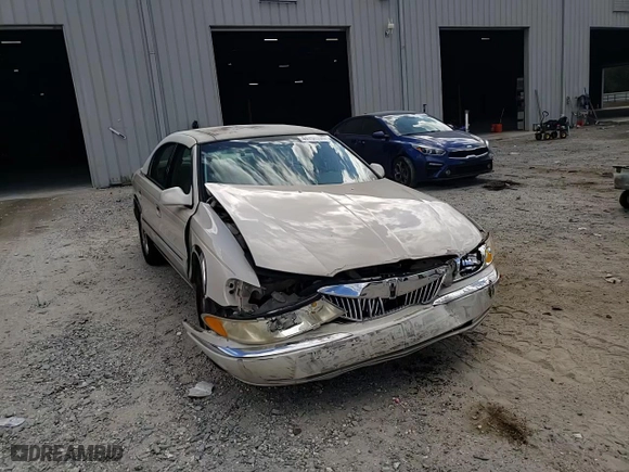 2001 Lincoln Continental with VIN 1LNHM97V01Y649261, listed as a Copart auction lot 44756395 with 141,648 mi miles and Salvage Title. Bid and sale history available at carsss.com. Image 11.