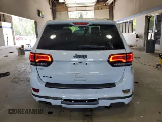 2018 Jeep Grand Cherokee Overland with VIN 1C4RJFCG5JC211145, listed as a Copart auction lot 54138865 with 115,679 mi miles and Salvage title. Bid and sale history available at DreamBid. Image 6.