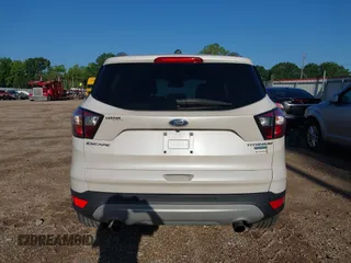 2017 Ford Escape Titanium with VIN 1FMCU0J90HUC51244, listed as a IAAI auction lot 42206165 with 106,847 mi miles and . Bid and sale history available at DreamBid. Image 16.