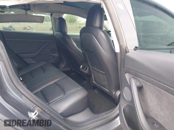 2022 Tesla Model 3 Performance with VIN 5YJ3E1EC3NF296891, listed as a IAAI auction lot 41808329 with 82,682 mi miles and . Bid and sale history available at DreamBid. Image 8.