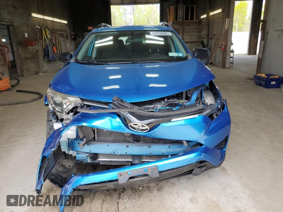 2016 Toyota RAV4 LE with VIN JTMBFREV5GJ104245, listed as a Copart auction lot 56658985 with 87,549 mi miles and Salvage Title. Bid and sale history available at DreamBid. Image 5.