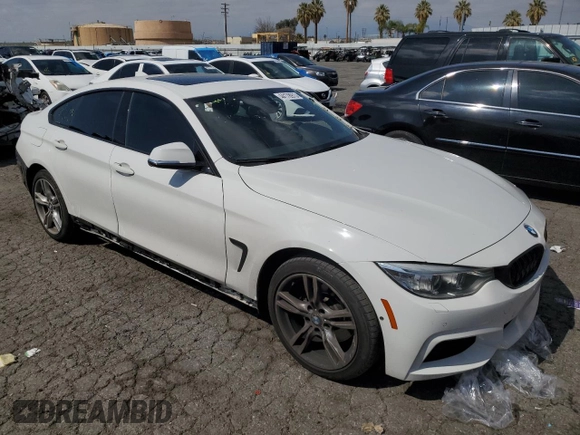 2015 BMW 4 Series 428i xDrive with VIN WBA4C9C58FG135227, listed as a Copart auction lot 44178973 with 91,571 mi miles and . Bid and sale history available at DreamBid. Image 4.