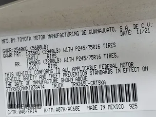 2022 Toyota Tacoma SR with VIN 3TYRX5GNXNT038474, listed as a IAAI auction lot 42090753 with 142,590 mi miles and . Bid and sale history available at DreamBid. Image 9.
