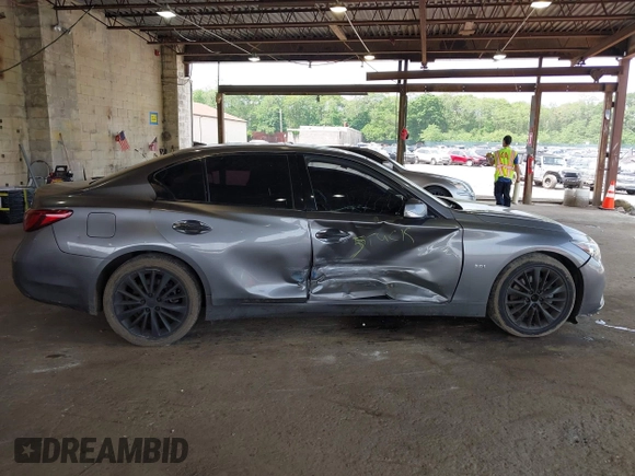 2019 Infiniti Q50 Luxe z VIN JN1EV7AR8KM594171, wystawiony jako IAAI lot #42428037 z przebiegiem 70 086 mil mil oraz . Historia ofert i sprzedaży dostępna na DreamBid. Obrazek 13.