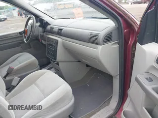 2007 Ford Freestar SE z VIN 2FMZA51657BA08748, wystawiony jako IAAI lot #42367996 z przebiegiem 134 531 mil mil oraz . Historia ofert i sprzedaży dostępna na DreamBid. Obrazek 5.