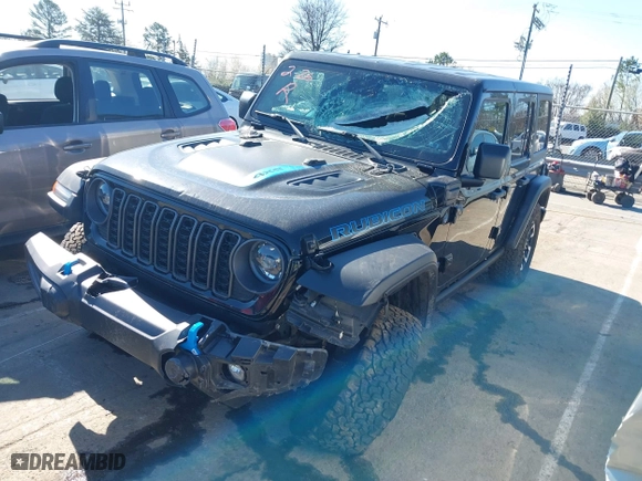 2024 Jeep Wrangler 4xe Rubicon with VIN 1C4RJXR65RW241101, listed as a IAAI auction lot 41778044 with 32,041 mi miles. Bid and sale history available at carsss.com. Image 17.