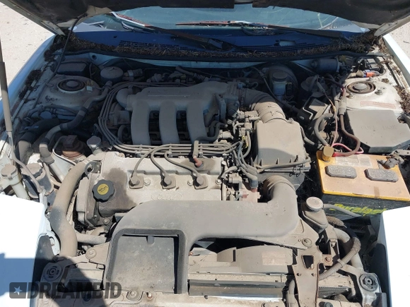 1996 Ford Probe z VIN 1ZVLT22B0T5127219, wystawiony jako IAAI lot #42279311 z przebiegiem 123 290 mil mil oraz . Historia ofert i sprzedaży dostępna na DreamBid. Obrazek 10.