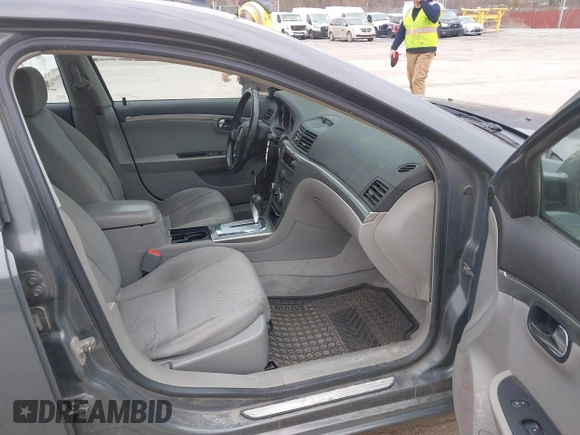 2009 Saturn Aura XE with VIN 1G8ZS57B19F190580, listed as a IAAI auction lot 41904208 with 214,773 mi miles and . Bid and sale history available at DreamBid. Image 5.