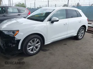 2021 Audi Q3 S line Premium z VIN WA1DECF31M1074155, wystawiony jako IAAI lot #42381678 z przebiegiem 36 894 mil mil oraz . Historia ofert i sprzedaży dostępna na DreamBid. Obrazek 2.