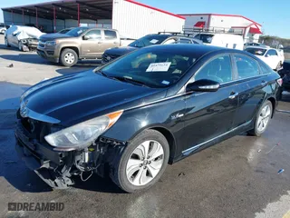 2013 Hyundai Sonata Hybrid Limited with VIN KMHEC4A40DA090333, listed as a IAAI auction lot 41479624 with 164,745 mi miles. Bid and sale history available at carsss.com. Image 18.
