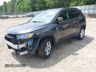 2019 Jeep Compass Latitude with VIN 3C4NJDBB8KT748588, listed as a IAAI auction lot 42224482 with 70,810 mi miles and . Bid and sale history available at DreamBid. Image 2.