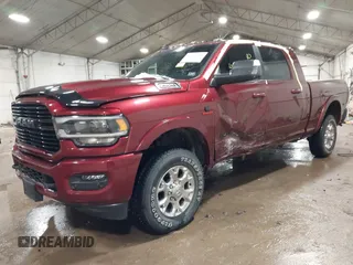 2021 Ram 2500 Laramie with VIN 3C6UR5NLXMG501736, listed as a IAAI auction lot 41377418 with 62,699 mi miles. Bid and sale history available at carsss.com. Image 2.