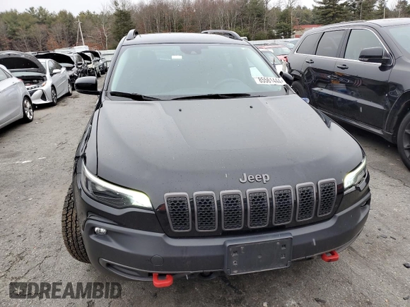 2022 Jeep Cherokee Trailhawk with VIN 1C4PJMBX3ND502322, listed as a Copart auction lot 85561444 with 57,630 mi miles and Salvage Title. Bid and sale history available at carsss.com. Image 5.