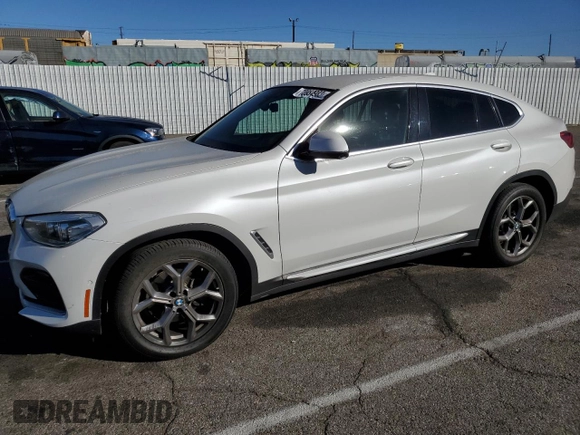 2020 BMW X4 xDrive30i with VIN 5UX2V1C09L9B97540, listed as a Copart auction lot 73984983 with 64,343 mi miles. Bid and sale history available at carsss.com. Image 1.