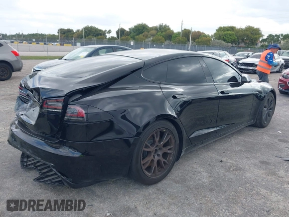 2023 Tesla Model S with VIN 5YJSA1E53PF510757, listed as a IAAI auction lot 42075624 with Not provided miles and . Bid and sale history available at DreamBid. Image 4.