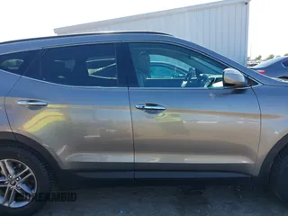2017 Hyundai Santa Fe 2.4L z VIN 5XYZU3LB4HG446961, wystawiony jako IAAI lot #42214109 z przebiegiem 140 175 mil mil oraz . Historia ofert i sprzedaży dostępna na DreamBid. Obrazek 13.