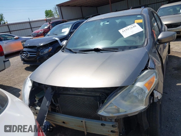 2016 Nissan Versa SV with VIN 3N1CN7AP3GL869789, listed as a IAAI auction lot 41997640 with 208,817 mi miles and . Bid and sale history available at DreamBid. Image 13.