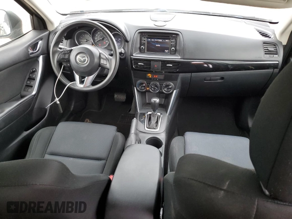 2015 Mazda CX-5 Sport z VIN JM3KE2BE4F0459532, wystawiony jako Copart lot #61049235 z przebiegiem 149 808 mil mil oraz Szkoda całkowita • Salvage title. Historia ofert i sprzedaży dostępna na DreamBid. Obrazek 8.