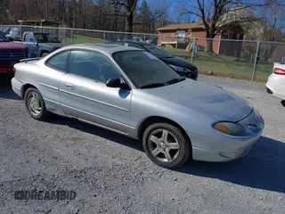 2001 Ford Escort ZX2 with VIN 3FAFP11321R241862, listed as a IAAI auction lot 41875706 with 284,720 mi miles. Bid and sale history available at carsss.com. Image 1.
