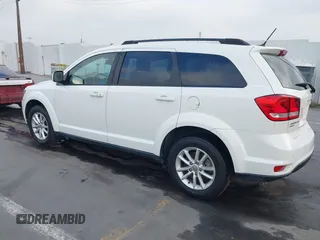 2015 Dodge Journey SXT with VIN 3C4PDDBG9FT600712, listed as a IAAI auction lot 42090741 with 111,741 mi miles and . Bid and sale history available at DreamBid. Image 3.