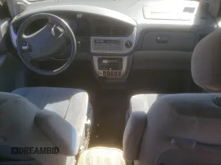 2002 Toyota Sienna LE with VIN 4T3ZF13C22U497021, listed as a Copart auction lot 52571055 with 232,973 mi miles and Salvage Title. Bid and sale history available at DreamBid. Image 8.