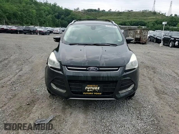 2015 Ford Escape Titanium with VIN 1FMCU9J95FUC36112, listed as a Copart auction lot 61374015 with 111,041 mi miles and Salvage title. Bid and sale history available at DreamBid. Image 14.