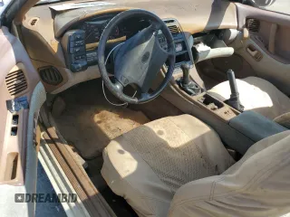 1991 Nissan 300ZX z VIN JN1RZ26H3MX504127, wystawiony jako Copart lot #74052424 z przebiegiem 48 904 mil mil oraz Szkody całkowita. Historia ofert i sprzedaży dostępna na DreamBid. Obrazek 8.
