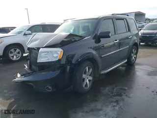 2015 Honda Pilot Touring with VIN 5FNYF4H90FB009528, listed as a IAAI auction lot 41652038 with 178,811 mi miles. Bid and sale history available at carsss.com. Image 18.