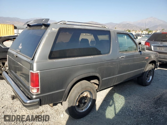 1988 GMC Jimmy z VIN 1GKCS18Z2J8541042, wystawiony jako Copart lot #78100004 z przebiegiem 199 916 mil mil oraz Czysty tytuł • Clean title. Historia ofert i sprzedaży dostępna na DreamBid. Obrazek 3.