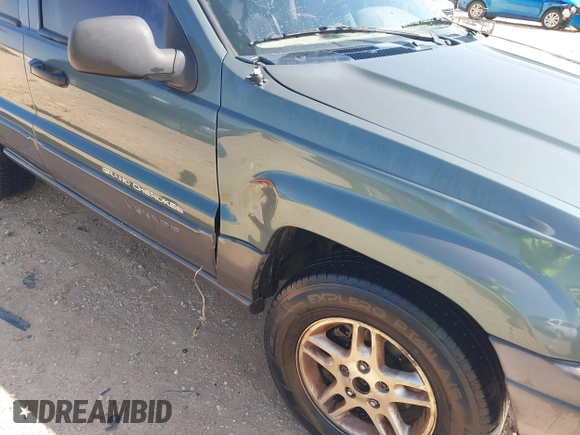 2002 Jeep Grand Cherokee Laredo с VIN 1J4GX48S42C287863, выставлен на аукционе IAAI как лот 41982433 с пробегом Не указан миль и . История ставок и продаж доступна на DreamBid. Изображение 6.