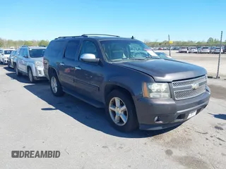 2011 Chevrolet Suburban LT with VIN 1GNSCJE03BR255374, listed as a IAAI auction lot 41826513 with 279,698 mi miles. Bid and sale history available at carsss.com. Image 1.