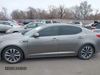 2014 Kia Optima SXL Turbo with VIN 5XXGR4A69EG312273, listed as a IAAI auction lot 41729863 with 107,660 mi miles and . Bid and sale history available at DreamBid. Image 14.