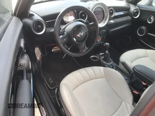 2012 MINI Coupe S z VIN WMWSX3C56CT154872, wystawiony jako Copart lot #68011264 z przebiegiem 91 650 mil mil oraz Szkody całkowita. Historia ofert i sprzedaży dostępna na DreamBid. Obrazek 8.