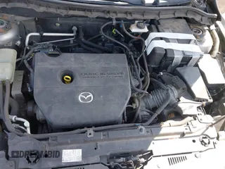 2010 Mazda Mazda3 i Touring with VIN JM1BL1SG5A1349036, listed as a IAAI auction lot 42038645 with 115,944 mi miles. Bid and sale history available at carsss.com. Image 10.