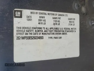 2002 Chevrolet Impala z VIN 2G1WF55E529224893, wystawiony jako Copart lot #80500034 z przebiegiem Nie podano mil oraz Szkoda całkowita • Salvage title. Historia ofert i sprzedaży dostępna na DreamBid. Obrazek 14.