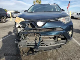 2017 Toyota RAV4 LE with VIN 2T3BFREV4HW660064, listed as a Copart auction lot 43660485 with 100,225 mi miles and Salvage Title. Bid and sale history available at DreamBid. Image 5.