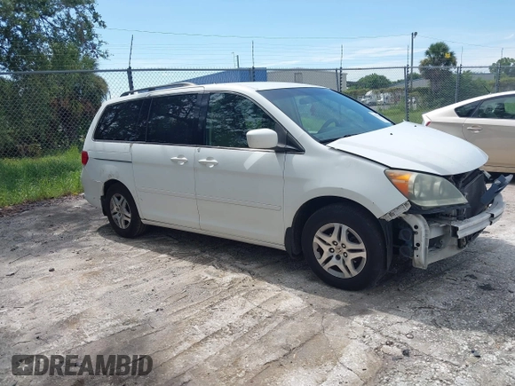 2010 Honda Odyssey EX with VIN 5FNRL3H5XAB015351, listed as a IAAI auction lot 42702296 with 202,919 mi miles and . Bid and sale history available at DreamBid. Image 1.