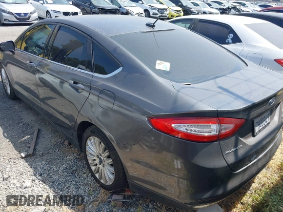 2016 Ford Fusion SE Hybrid z VIN 3FA6P0LU0GR218685, wystawiony jako IAAI lot #42550930 z przebiegiem 178 041 mil mil oraz . Historia ofert i sprzedaży dostępna na DreamBid. Obrazek 3.
