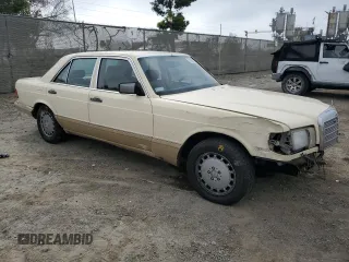 1989 Mercedes-Benz 300 with VIN WDBCA24D2KA430787, listed as a Copart auction lot 50655785 with 145,064 mi miles and Salvage Title. Bid and sale history available at DreamBid. Image 4.