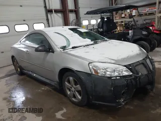 2006 Pontiac G6 GT with VIN 1G2ZH158564203718, listed as a IAAI auction lot 41519634 with 210,994 mi miles. Bid and sale history available at carsss.com. Image 1.