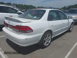 2002 Honda Accord EX z VIN 1HGCG16542A053039, wystawiony jako IAAI lot #42308687 z przebiegiem 206 864 mil mil oraz . Historia ofert i sprzedaży dostępna na DreamBid. Obrazek 4.