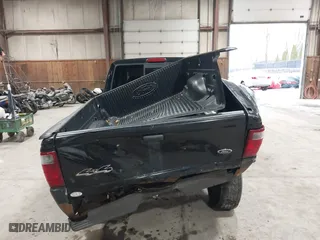 2003 Ford Ranger XL Fleet with VIN 1FTZR45E03PB80360, listed as a IAAI auction lot 41856380 with 193,523 mi miles. Bid and sale history available at carsss.com. Image 16.