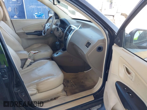 2007 Hyundai Tucson SE with VIN KM8JN12D07U475917, listed as a IAAI auction lot 41872876 with 172,006 mi miles. Bid and sale history available at carsss.com. Image 5.