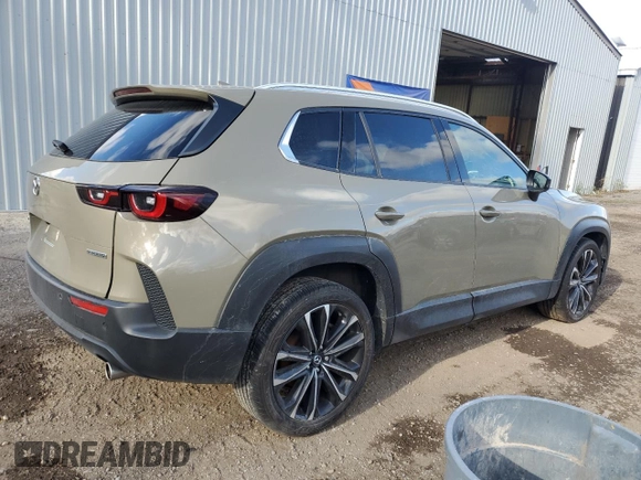 2023 Mazda CX-50 S Premium with VIN 7MMVABDM6PN133662, listed as a Copart auction lot 79394114 with 32,616 mi miles and Salvage Title. Bid and sale history available at DreamBid. Image 3.