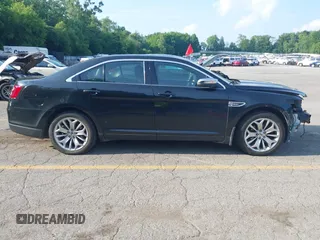 2014 Ford Taurus Limited with VIN 1FAHP2F86EG163392, listed as a IAAI auction lot 42538336 with 131,910 mi miles and . Bid and sale history available at DreamBid. Image 14.
