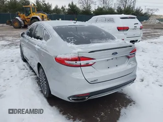 2017 Ford Fusion Titanium with VIN 3FA6P0K91HR117198, listed as a IAAI auction lot 41346552 with 76,951 mi miles. Bid and sale history available at carsss.com. Image 3.