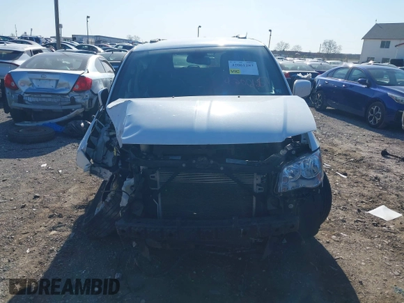 2019 Dodge Grand Caravan SXT with VIN 2C4RDGCG1KR545775, listed as a IAAI auction lot 42061287 with 131,603 mi miles and . Bid and sale history available at DreamBid. Image 12.